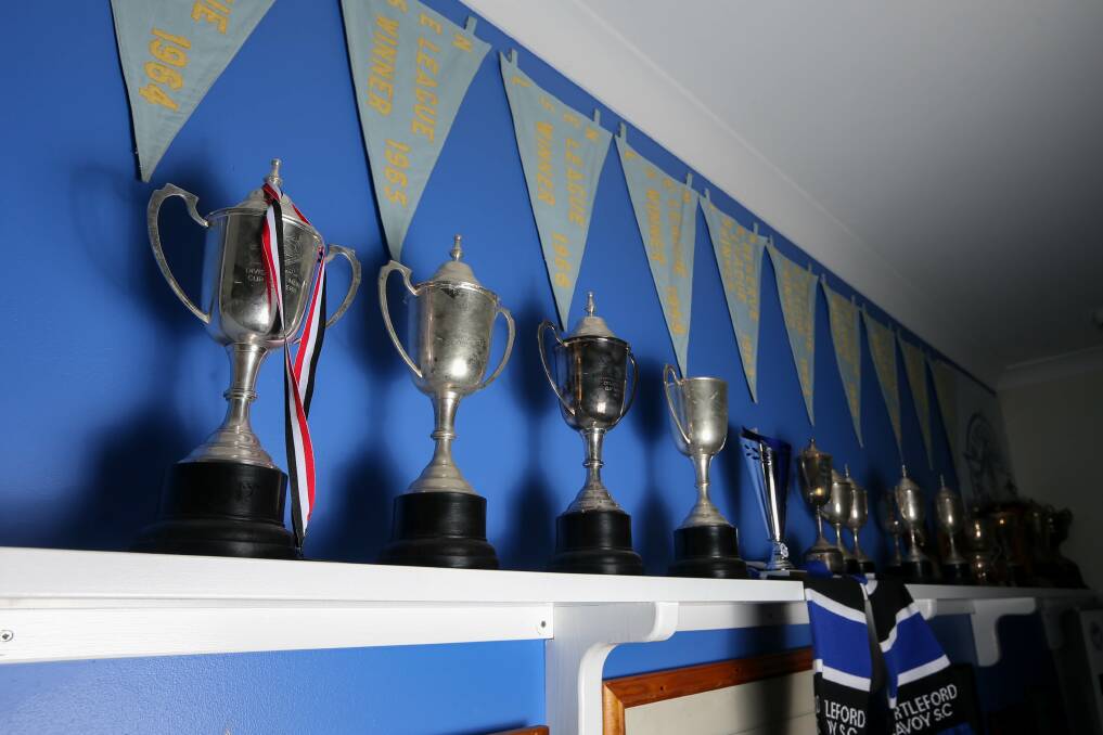 SUCCESS: A number of Myrtleford's trophies and flags are housed in the member's bar at Club Savoy. Picture: TARA TREWHELLA