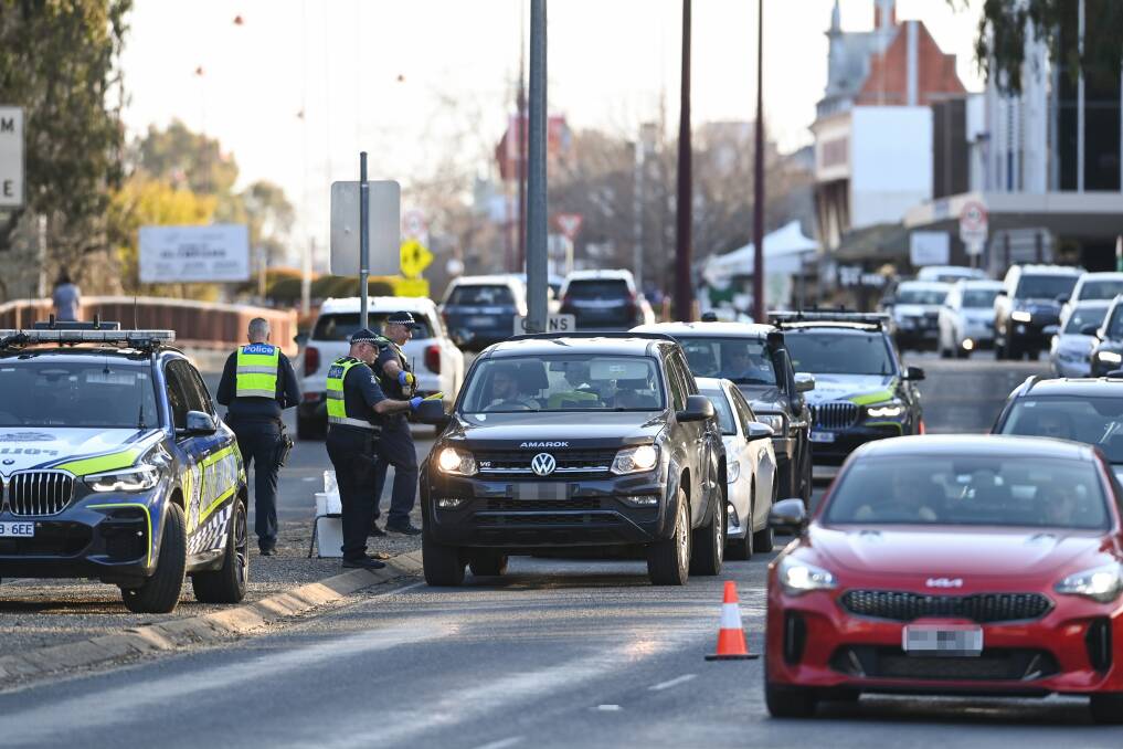Victoria State Highway Patrol officers breath testing motorists in Wangaratta on Saturday, September 2. Picture by Mark Jesser