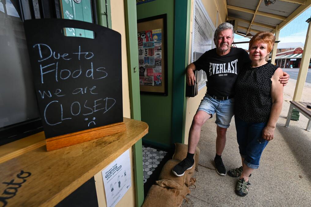 COSTLY: Chiltern's Golden Ball Cafe and Gelato Bar owners John and Enza Rumble were forced to close on Sunday due to flooding. Picture: MARK JESSER