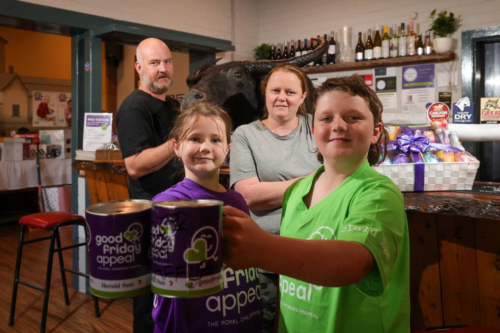 WORTHY CAUSE: Boorhaman Hotel's Nick and Katie Batchelor. with Katie's children, Charlee, 8, and William Wahlert, 11, hosted an annual auction for the Good Friday Appeal. Picture: JAMES WILTSHIRE