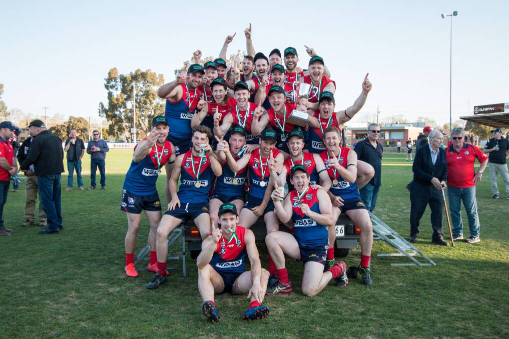 RED AND BLUE: Milawa were comprehensive winners against Bright in the 2019 Ovens and King grand final. Picture: MARC BONGERS
