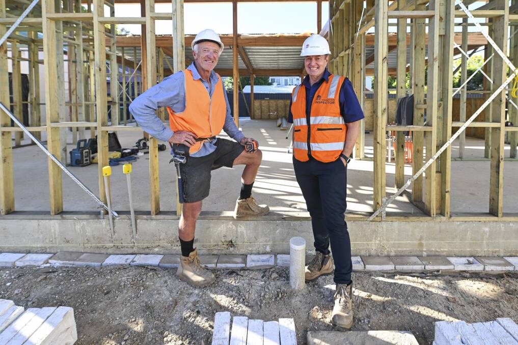 Dean McGuire, of DT Building Contractors in Albury, speaks to SafeWork NSW principal inspector Stuart Larkin on Thursday, April 11, ahead of a cross-border safety blitz commencing on Monday, April 15. Picture by Mark Jesser
