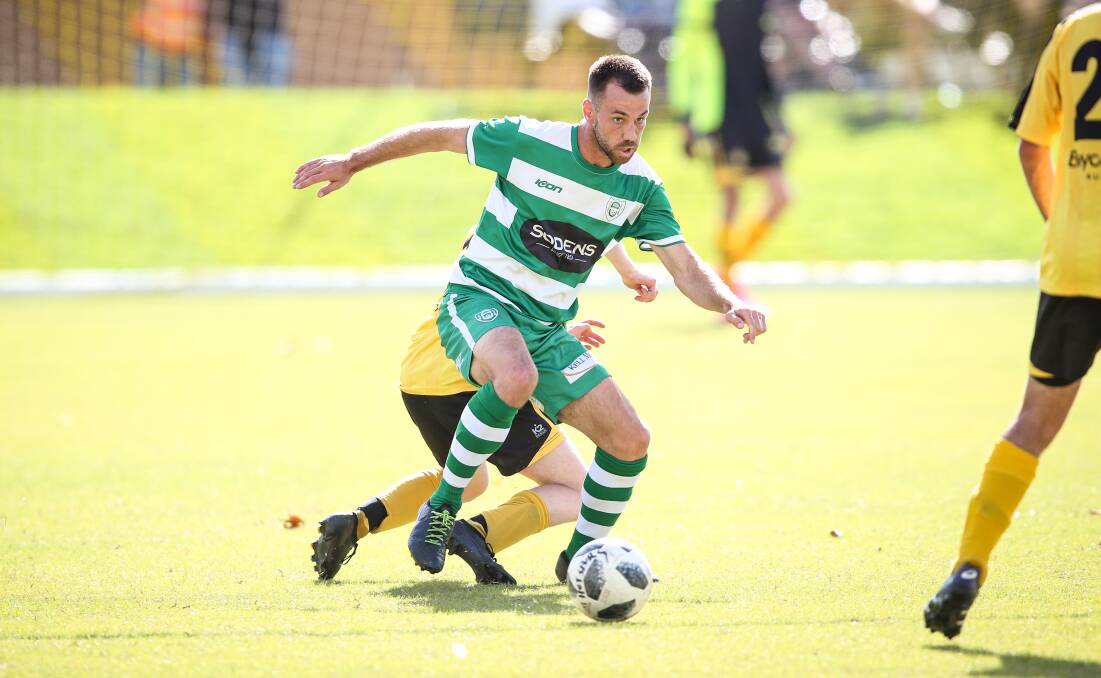 LEAD FROM THE FRONT: Albury United co-captain Caleb Martin scored in the Greens' 5-0 victory against Wodonga Diamonds at Jelbart Park on Saturday night.