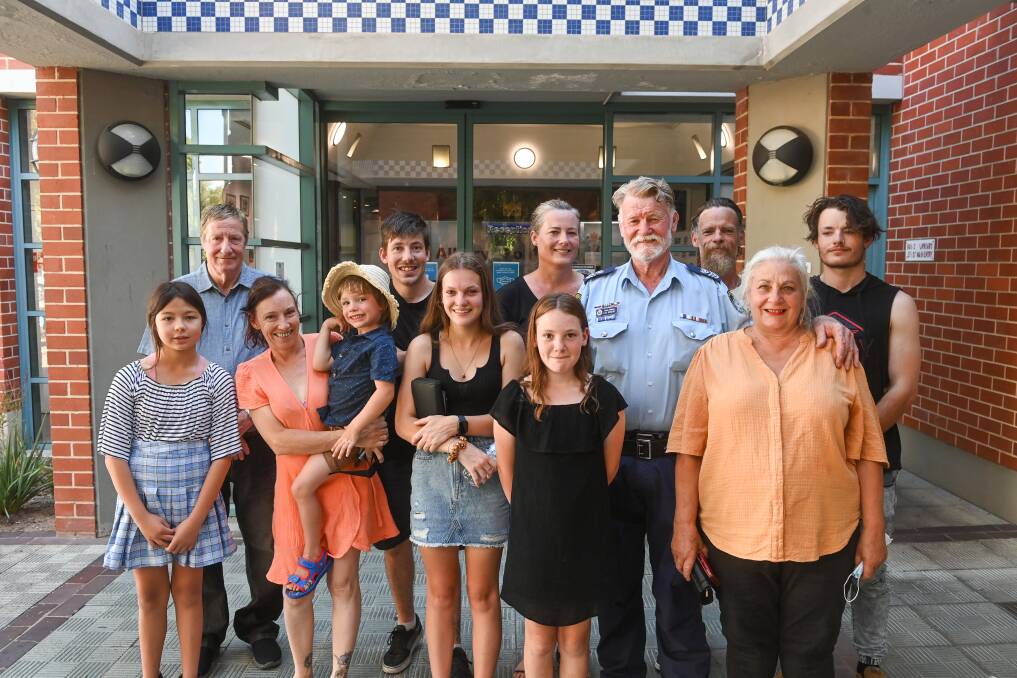 FAREWELL: Senior Sergeant Les Nugent was greeted by many friends and family after his final day as a police officer in Albury on New Year's Eve. Picture: MARK JESSER