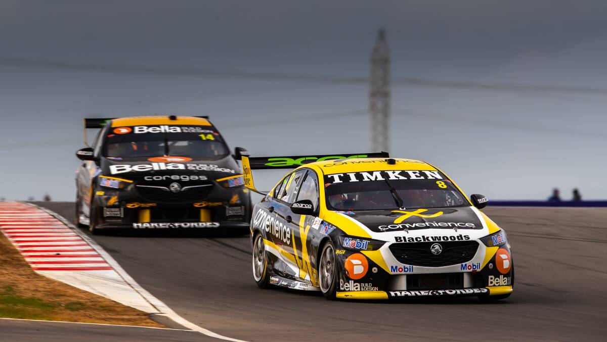 HEAD TO HEAD: Brad Jones Racing drivers Nick Percat (front) and Tim Slade compete for positions during the Supercars round at Tailem Bend. Picture: DANIEL KALISZ