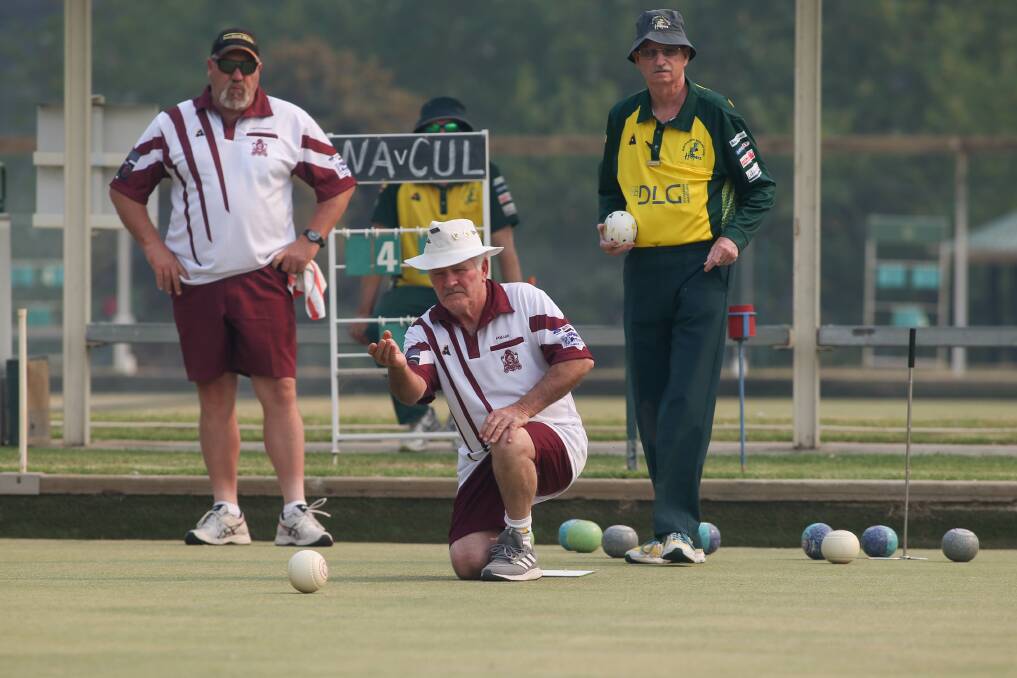 NO GO: Culcairn's Phil Lee sends down a bowl during the Albury and District triples finals. Round three of the association's pennant competition has been called off due to predicted high temperatures.
