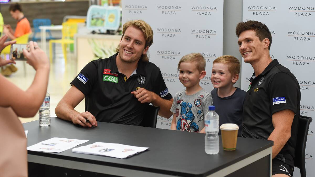 YOUNG FANS: Max Lynch and Brody Mihocek with friends Regan Holmquest, 5, and Oliver Fagan, 5, from Thurgoona and Wodonga, during Collingwood's visit to Wodonga on Wednesday.