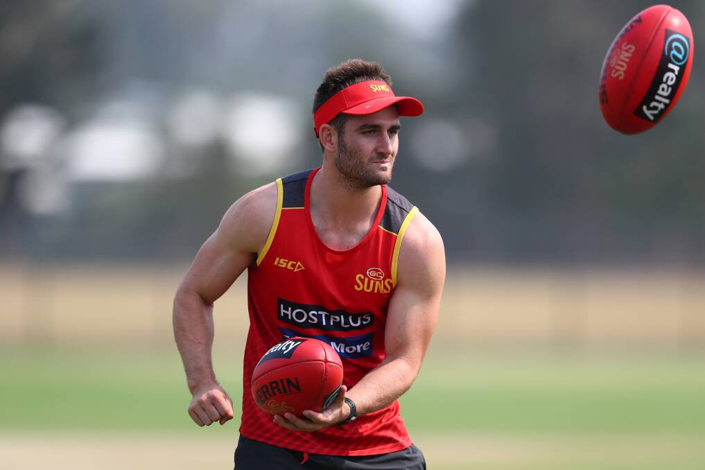 HERE COMES THE SUN: Anthony Miles finished his AFL career of 10 years with 88 matches to his name. Picture: GOLD COAST SUNS