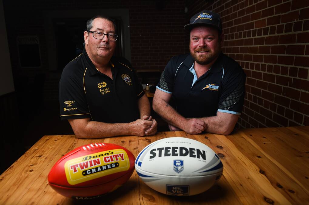 JOINING FORCES: Barnawartha and Wodonga Storm presidents Chris Peirce and Bill Bell ahead of a huge weekend of football. Picture: MARK JESSER