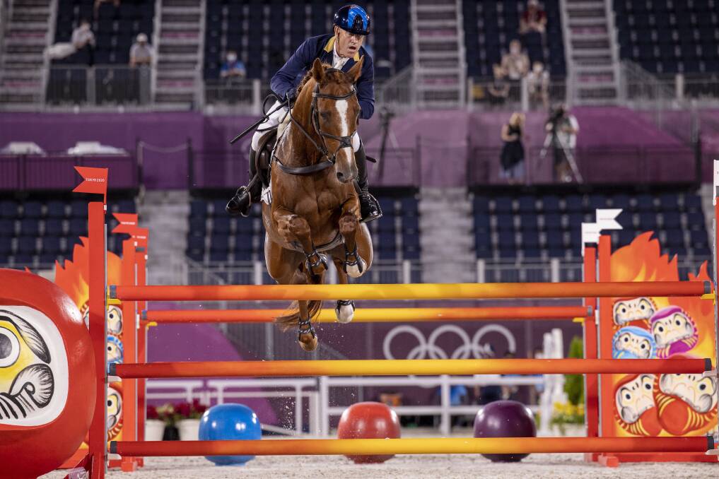 MAGNIFICENT: Andrew Hoy and Vassily De Lassos navigate the showjumping course en route to silver and bronze at the Tokyo Olympics. Picture: SIPA USA