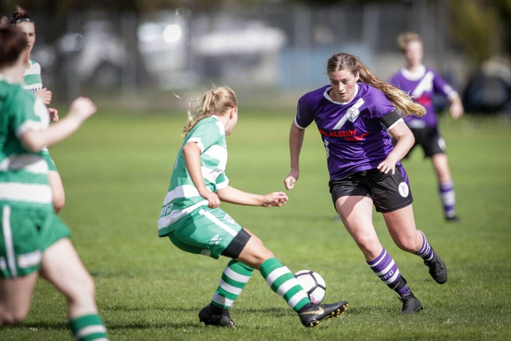 TOUGH TIMES: Melrose captain Maya Davis in action against Albury United in the six-team AWFA senior women's league last season. Melrose remain one of six clubs with a side in the competition in 2020.