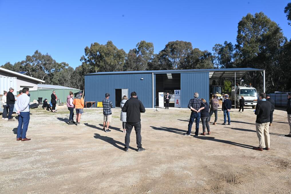 INTERESTED PARTIES: The auction of a commercial freehold lot at 75c Thomas Mitchell Drive in Wodonga drew a strong crowd on Friday. The property sold under the hammer for $745,000. Picture: MARK JESSER