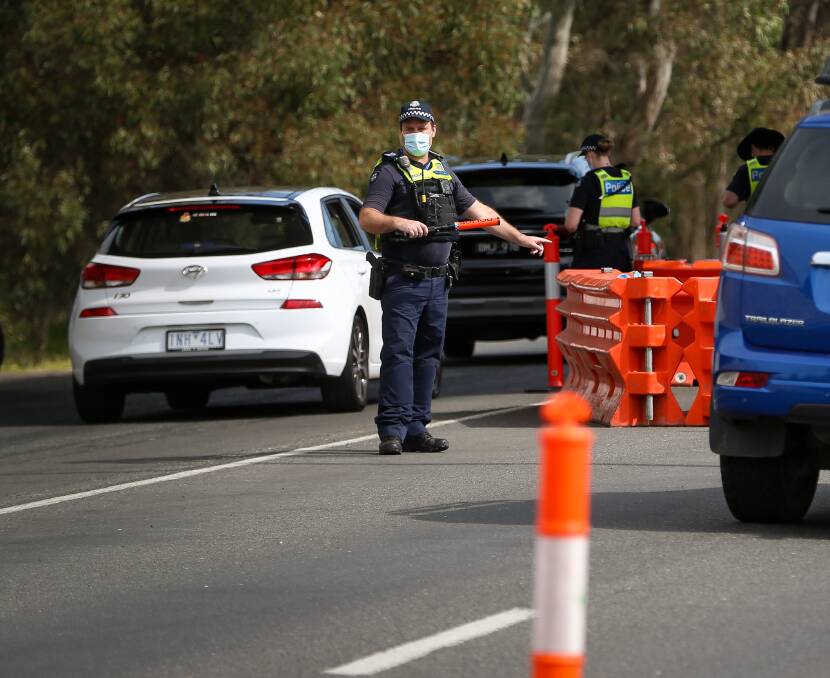WINDING BACK: Rules on entering Victoria have eased for travellers in NSW and ACT after the state government reclassified red zones as orange as of midnight. Picture: JAMES WILTSHIRE