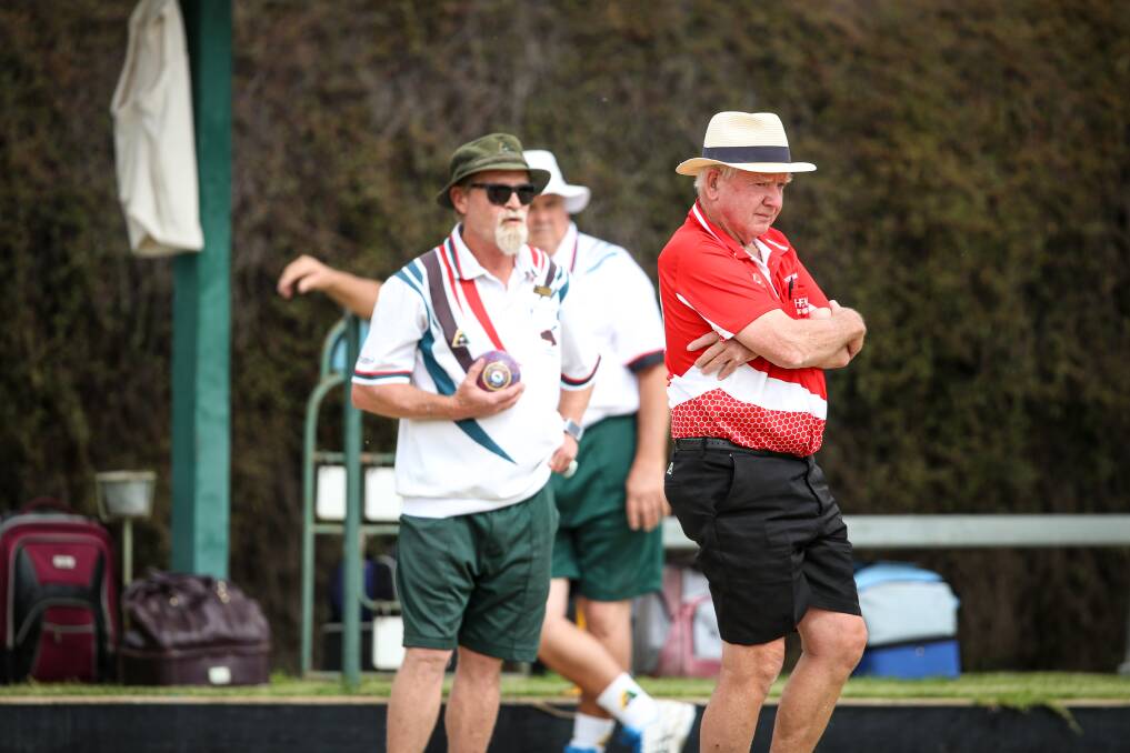 FOCUS: Henty's Peter Campbell watches his bowl closely during last year's pennant grand final against Lavington.