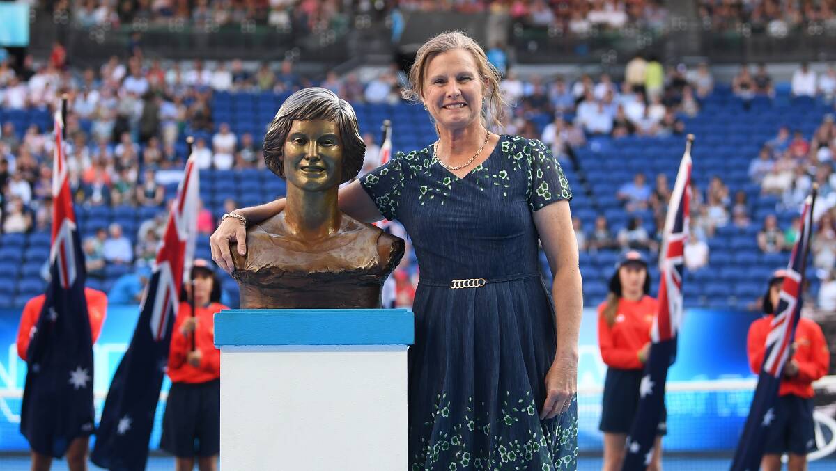 OVERWHELMED: Dianne Balestrat with a bust in her likeness during her induction into the Australian Tennis Hall of Fame earlier this week. Picture: AAP IMAGE/LUKAS COCH