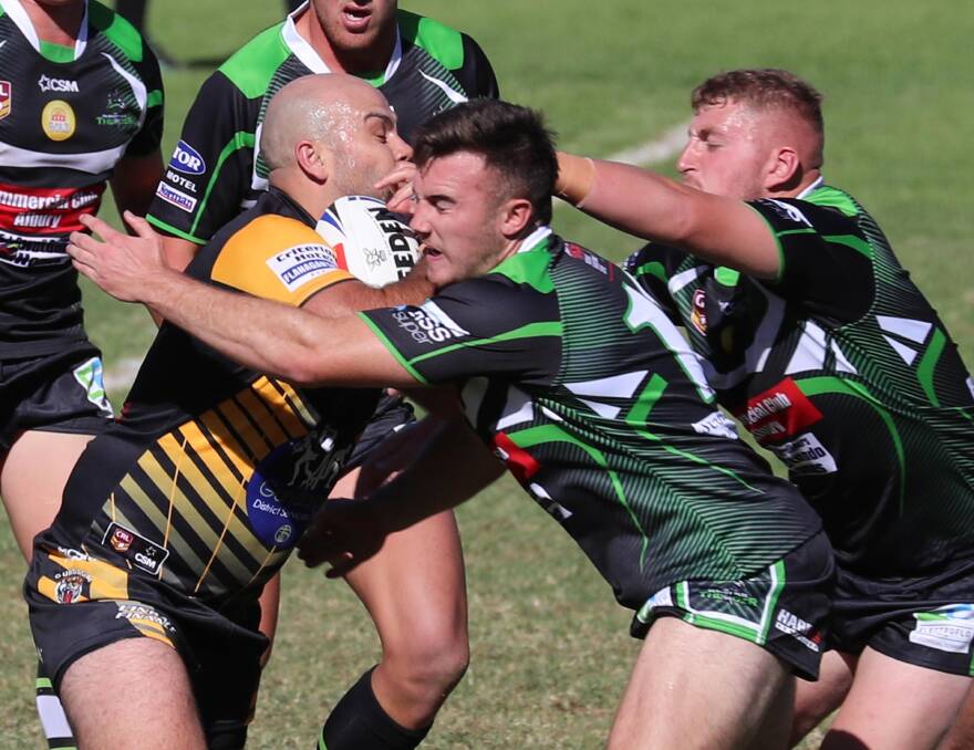 CRUNCH: Albury Thunder's Liam Wiscombe tackles Gundagai's Blake Dunn during their thrilling 28-all draw on Sunday. Picture: THE DAILY ADVERTISER