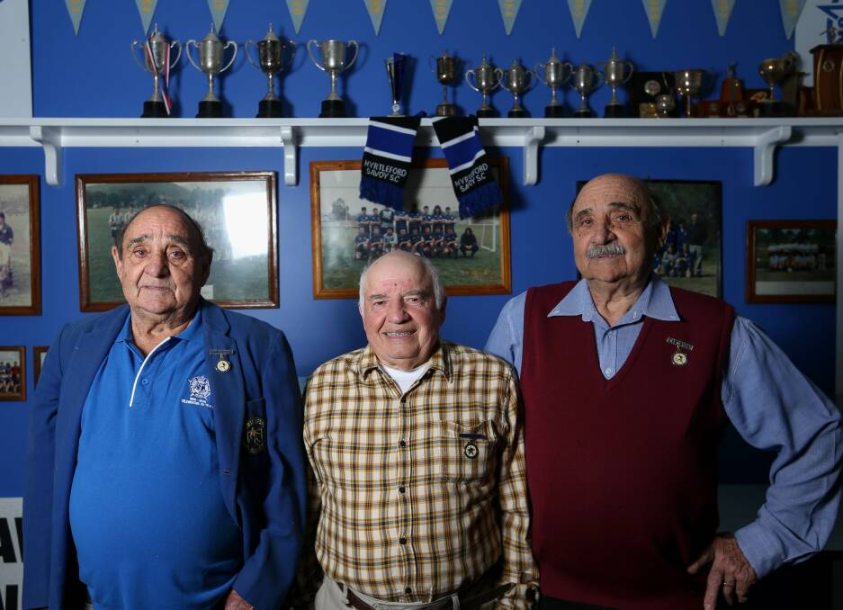 REMINISCE: Myrtleford Savoy stalwarts Remigio Novak, Dario Marotta and Adrian Novak are looking forward to celebrating the club's 60th anniversary on Saturday night. Picture: TARA TREWHELLA