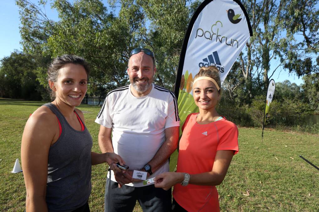 Volunteer Stacey Loccisano Melbourne runner Brendan Peel and event director Sarah Biggs at the first Albury Wodonga parkrun on March 8, 2014. File picture