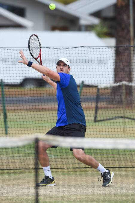 WELL PLAYED: Mark Shanahan combined with Jade Culph to claim the Labour Day doubles at Wodonga Tennis Centre on Monday. Picture: MARK JESSER