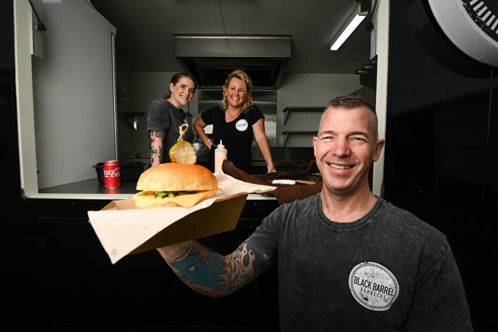 COME AND GET IT: Black Barrel Barbecue's Eddy Godde, Aoileann Godde and Amy Grant have offered to serve free meals to anyone who has lost work due to the recent COVID-19 lockdown. Picture: MARK JESSER