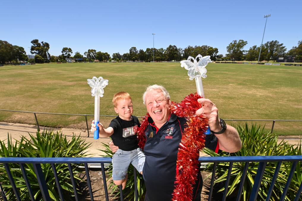 FAMILY FUN: Wodonga Raiders Football Netball Club president Mark Johnston with grandson, Harvey Johnston, 3, is looking forward to the New Year's Eve fireworks event at Birallee Park next week. Picture: MARK JESSER
