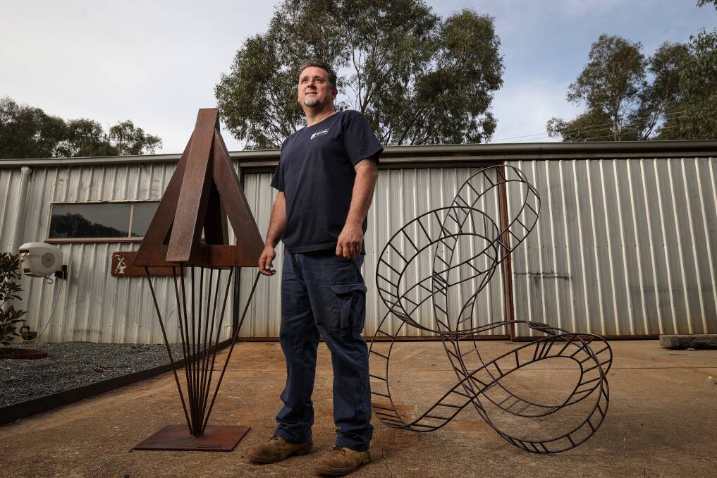 UNIQUE DESIGNS: Splitters Creek sculptor Chris Jolly is excited to show off two of his sculptures at this weekend's Melbourne International Flower and Garden Show. It will be his first major exhibit. Picture: JAMES WILTSHIRE