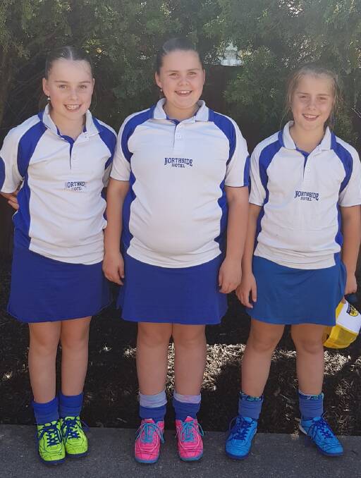 THREE'S A CROWD: Triplets Bella, Sienna and Indi Drummond will all play in the under 12s grand final for Norths against United on Saturday.