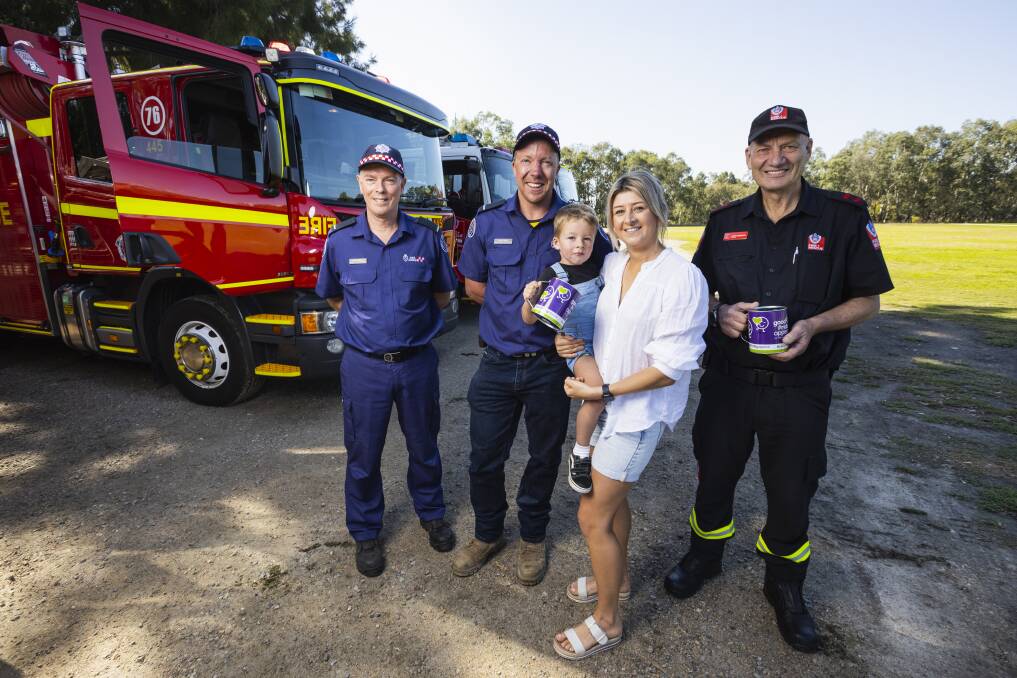 Wodonga CFA's Read Hedditch, Kyle Tooley, son Eddy Tooley, 3, Bailea McAullife and Albury Civic Fire and Rescue captain John Vandeven hope to see plenty of donations from the community for the 2023 Good Friday Appeal. Picture by Ash Smith
