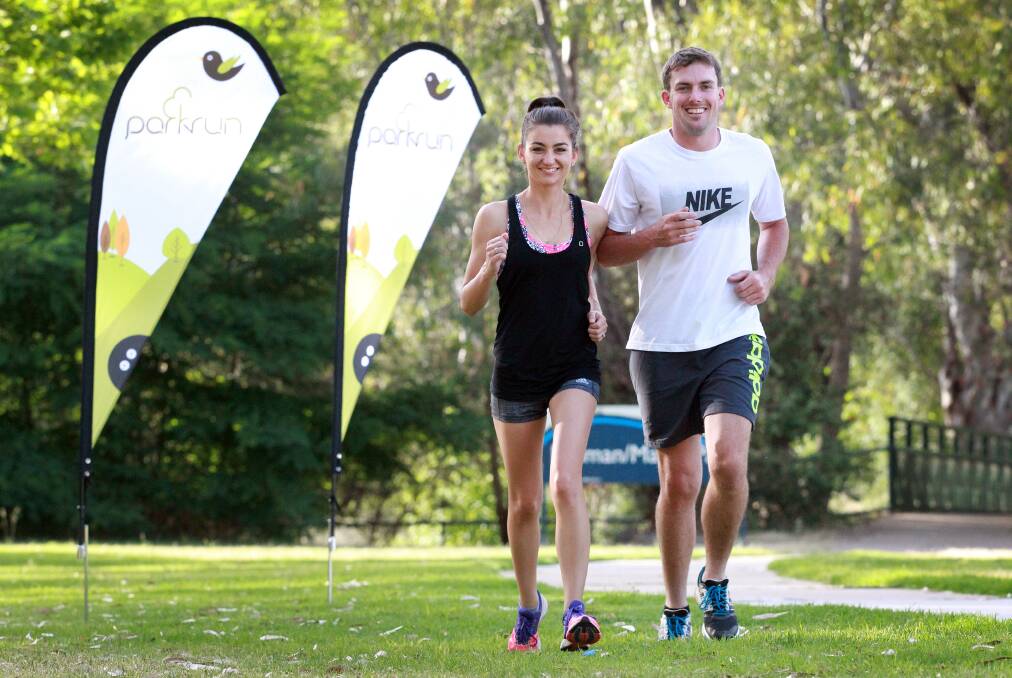 Albury Wodonga parkrun founders Sarah and Curtis Biggs in 2014 after being nominated for Albury Council Community Group of the Year. File picture
