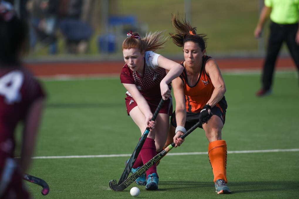 HARD WORK: Rylee Pontt played in Wodonga's 2-0 win against Magpies at Wodonga Hockey Centre on Thursday night. The Bulldogs sit equal top with Falcons.