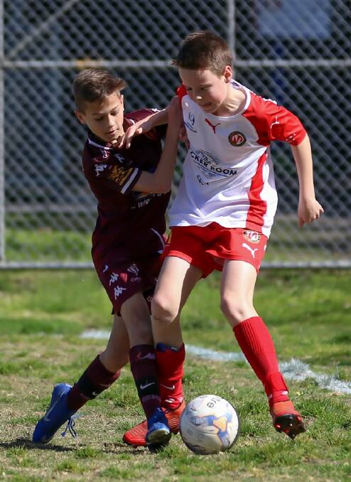 REWARDED FOR EFFORT: Murray United under-12s player Ryan Kemp (right) impressed Melbourne Victory scouters enough to earn a contract to play at the A-League club next season.
