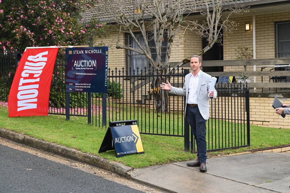 FINAL CALL: Stean Nicholls Real Estate auctioneer asks for offers for 209 Bernhardt Street in East Albury on Saturday. Picture: MARK JESSER