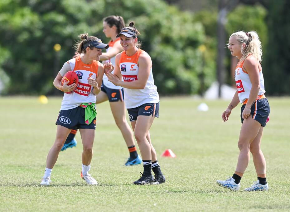 READY TO FIRE: Holbrook's Alyce Parker trains with captain Alicia Eva during the GWS Giants' pre-season stay in Albury last month. Picture: MARK JESSER