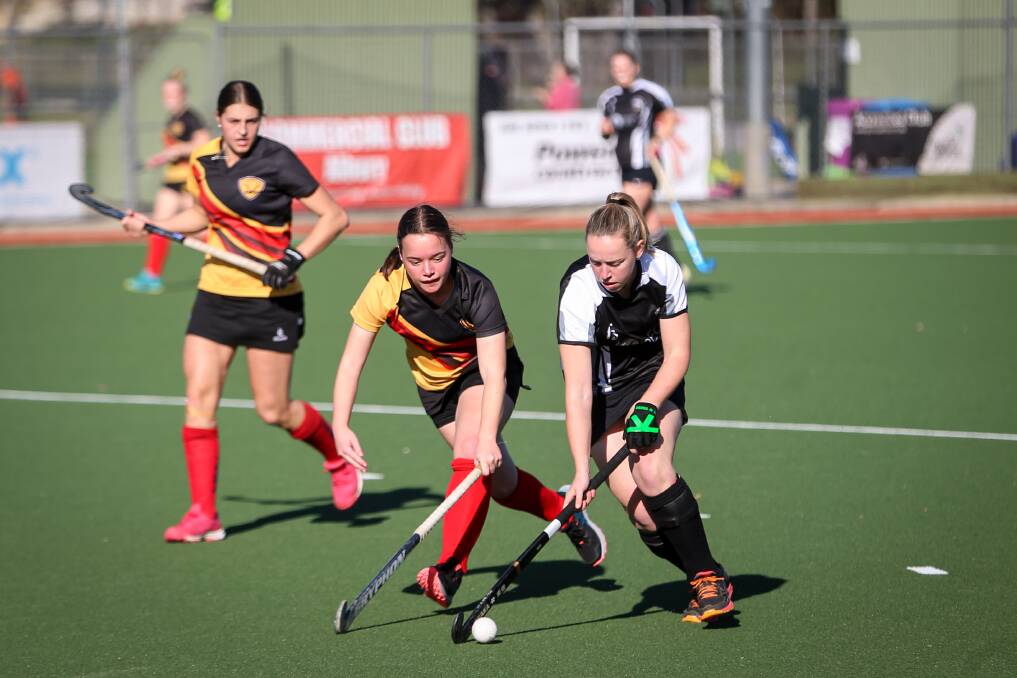 WATCH OUT: Magpies' Riley Sutherland looks for a way past CR United's defence in the division one women's clash at Albury Hockey Centre on Sunday. Picture: JAMES WILTSHIRE