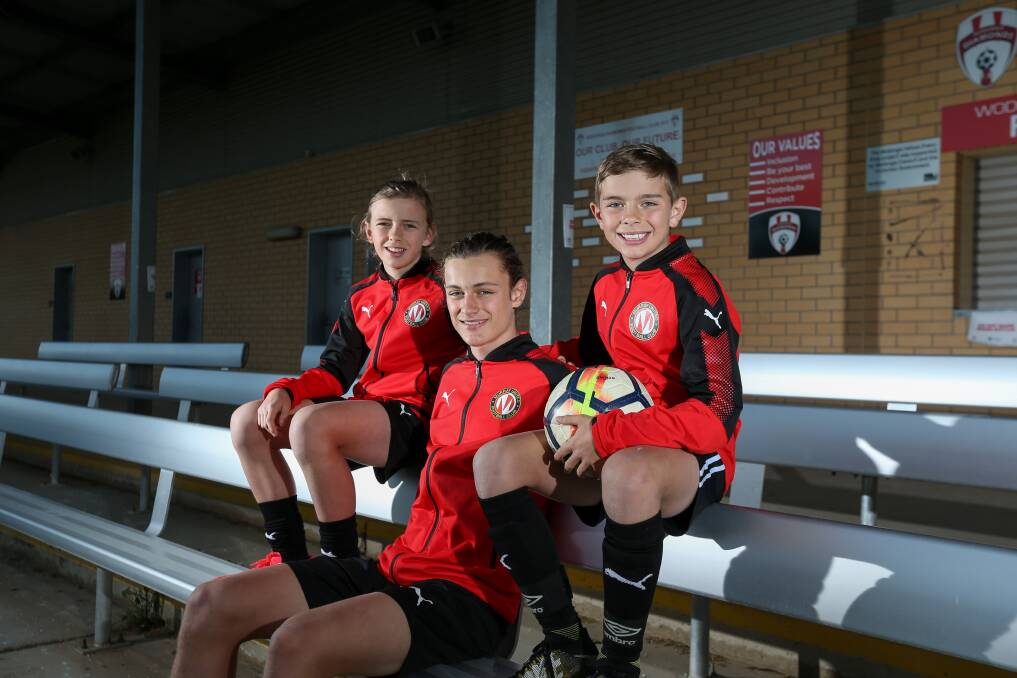 THREE'S A CROWD: Brothers Lachy, 13, Liam, 15 and Hunter, 10, Macgowan enjoyed their time playing at Murray United, even though the season was cut short. Picture: TARA TREWHELLA