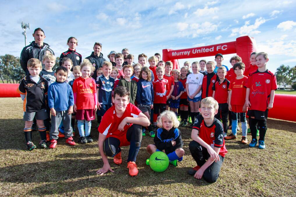 BIG TURNOUT: Wodonga Diamonds' Tom Dean (9), Albury City's Mason Vlaskic (5) and Murray United junior Samuel Murtagh (10), were three of several youngsters to attend Murray United's school holiday clinics. Picture: SIMON BAYLISS