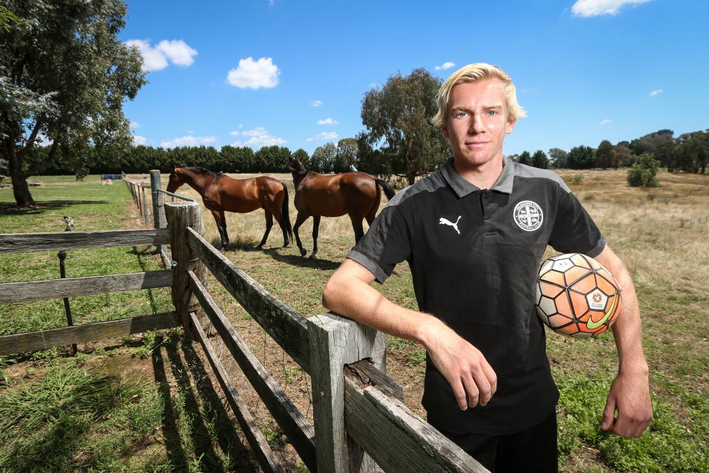 MAGIC MOMENT: Wooragee's Alec Mills relaxes at home after his A-League debut with Melbourne City against Central Coast. Picture: JAMES WILTSHIRE