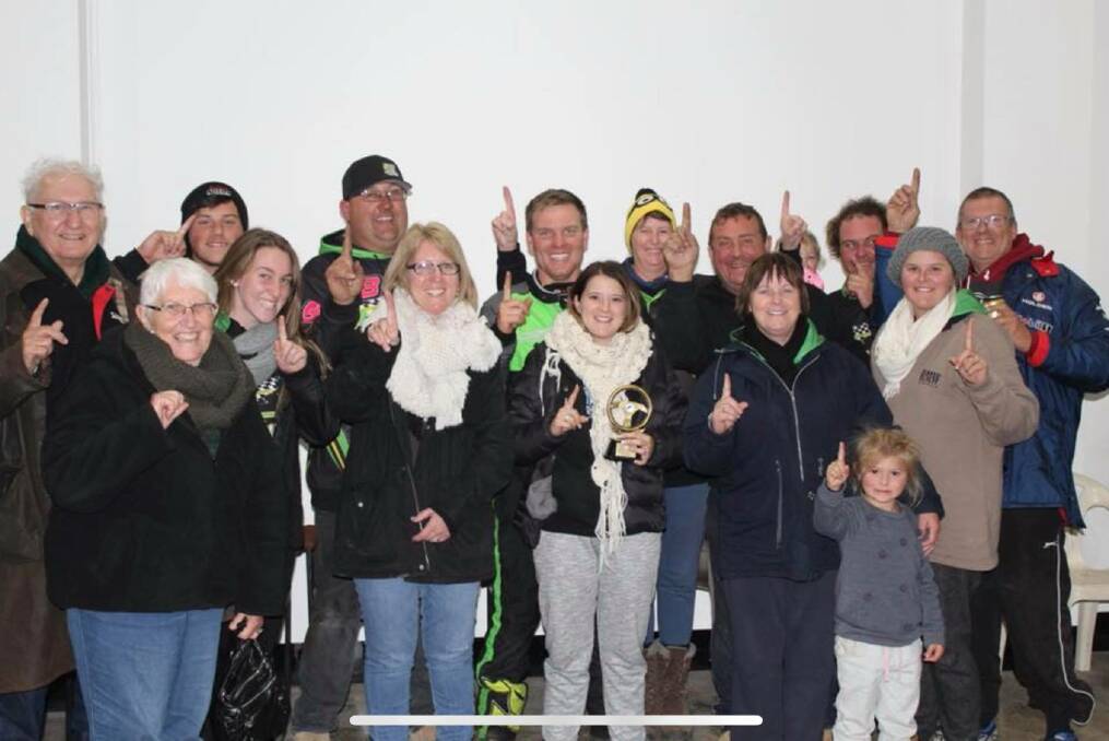 ALL SMILES: The Patriot Motorsport family celebrates its impressive Top Gun victory.
