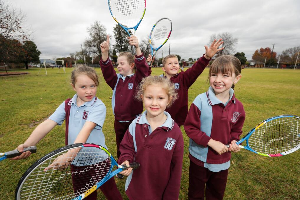 MAKING A RACQUET: Taylor Mitchell, Sienna Linssen, Montana Parker, Nate Parsons and Ava Hitchcock show off Wodonga Primary School's new racquets. Picture: JAMES WILTSHIRE