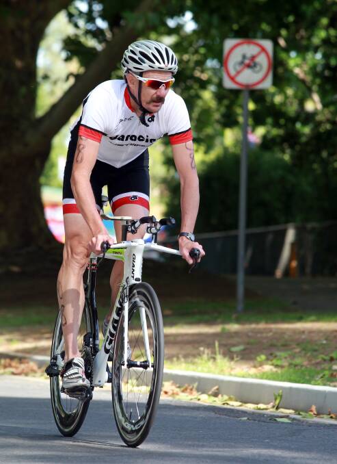 PEDAL POWER: Paul Hill in action on the bike at the Corowa Triathlon.