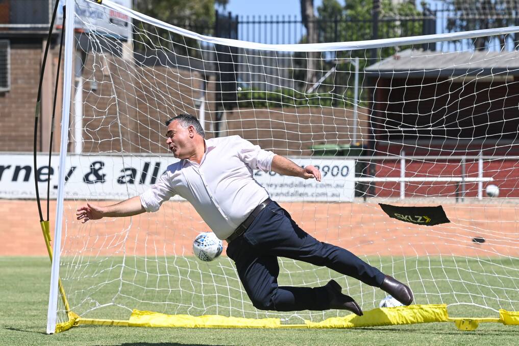 FULL STRETCH: NSW Deputy Premier John Barilaro dives to make a save during a major funding announcement for regional NSW ahead of the 2023 FIFA Women's World Cup at Lavington Sportsground on Wednesday. Picture: MARK JESSER