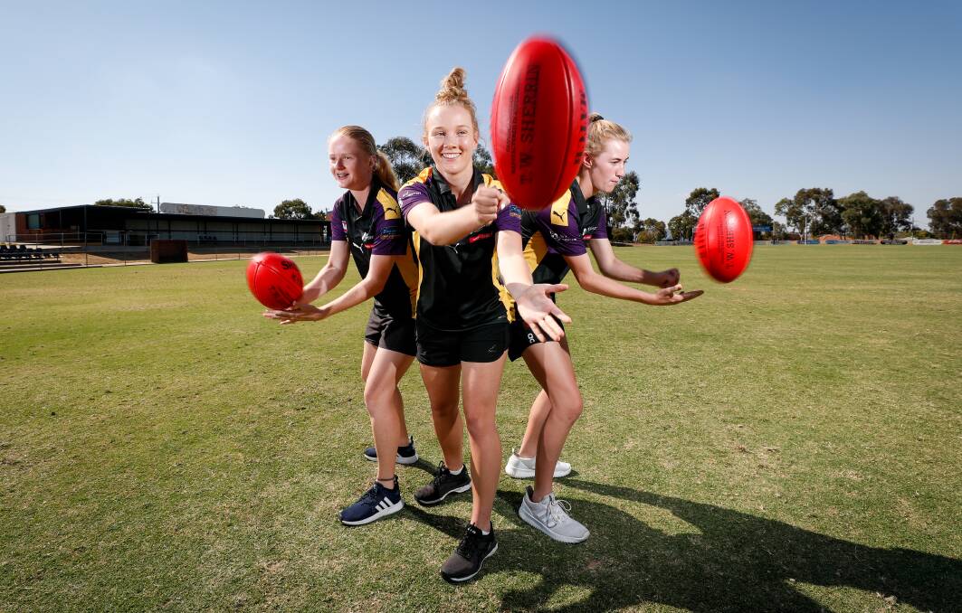IT'S ON: Murray Bushrangers under-18s stars Chelsea Styan and Amy Richardson with under-16s captain Keeley Skepper ahead of the season opener. Picture: JAMES WILTSHIRE
