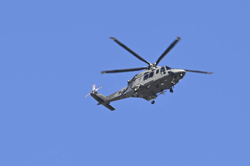 A Victoria Police helicopter seen flying over Wodonga on Wednesday, April 3. Picture by Mark Jesser