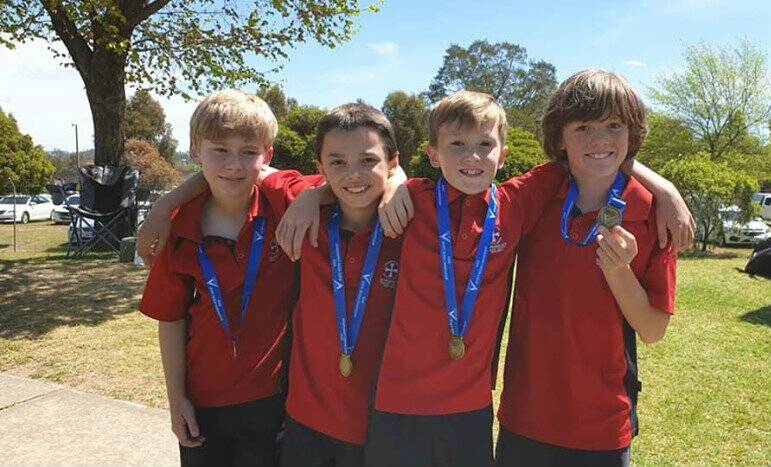 FAB FOUR: Lachlan Crawford, Jaxon Rigoni, Jack Abbruzzese and Seth Graham are set to become the first St Monica's Primary School relay team to compete at state level.