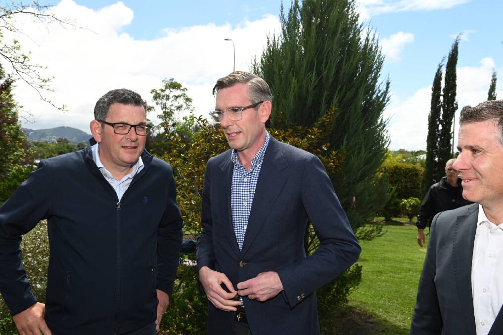 Victorian and NSW premiers Daniel Andrews and Dominic Perrottet with Albury MP Justin Clancy for the announcement of a major redevelopment for Albury hospital on Thursday. Picture by Mark Jesser