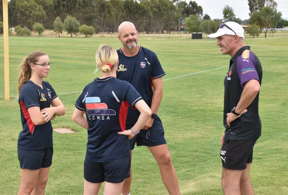 VITAL PARTNERSHIP: Cathedral College Wangaratta academy coordinator Dale Carmody and Murray Bushrangers talent manager Mick Wilson with Cass Mailer and Keeley Skepper. Mailer and Skepper are both students at the college and are in the Bushrangers' under-18 girls squad.