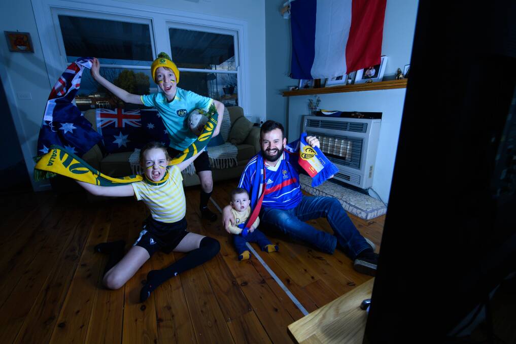 Albury siblings Evie, 9, and Moss Roseby, 10, will be cheering on the Matildas in the FIFA Women's World Cup quarter final on Saturday, August 12, but family friend Sylvain Vergos, with his son Mathis, five months, is equally as passionate about his home nation France. Picture by Mark Jesser