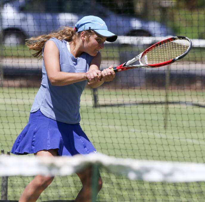 BIG PLAY: Chiara Di Tommaso hits a classic backhand down the line during her match with Alana Repanich on Saturday at Wodonga Tennis Centre.