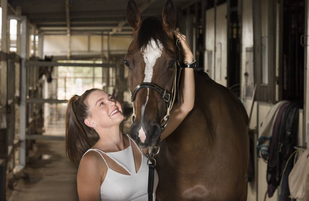 WINNING WAYS: Albury horse trainer Jodie Bohr's daughter Hollee, 17, is all smiles after Via Torrone's second successive win at Corowa on Friday. Picture: SIMON BAYLISS 