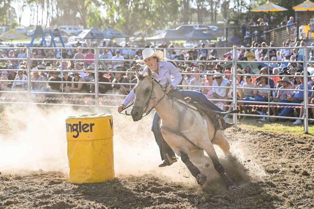 AROUND SHE GOES: Erika Quinn contests the barrel race at the Kinross Country Rodeo at Thurgoona's Kinross Woolshed on Thursday night. Picture: MARK JESSER